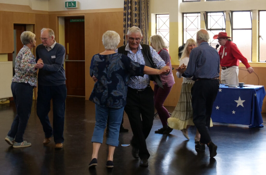 Group members enjoying American Square Dancing in May 2025