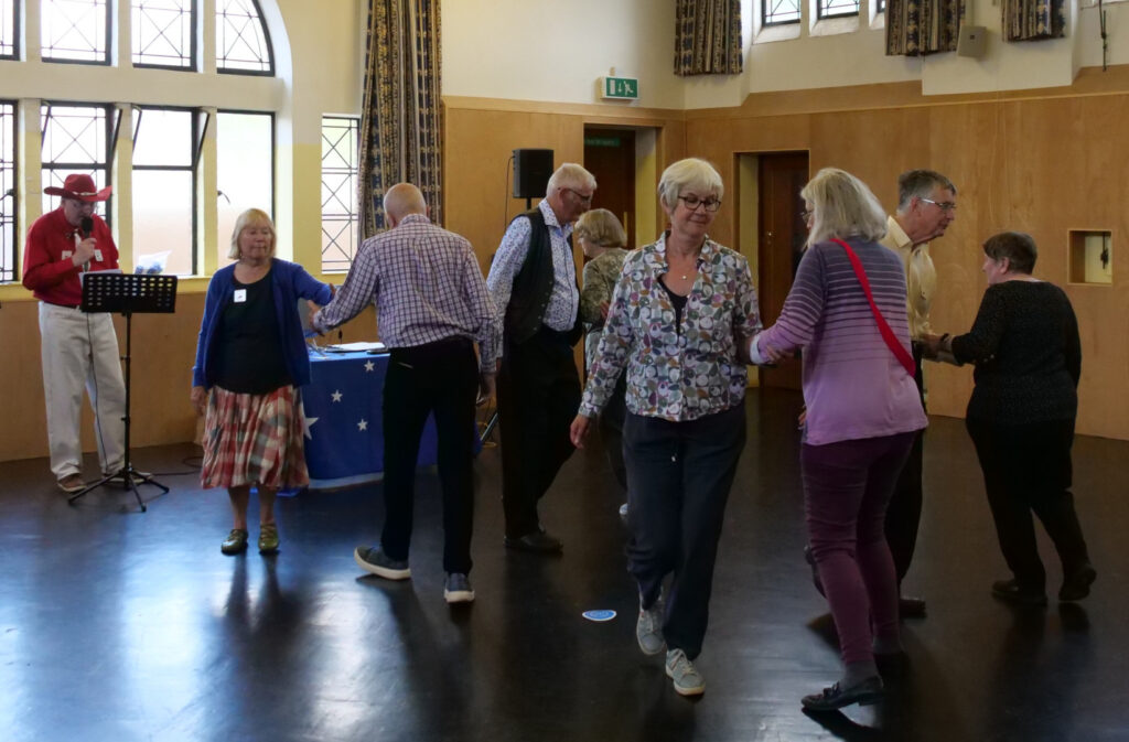 Group members enjoying American Square Dancing in May 2025